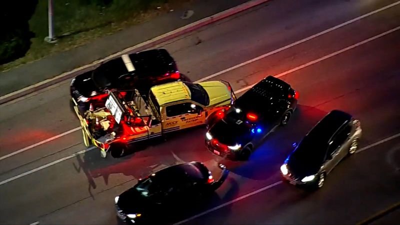 Watch stolen tow truck smashing vehicles during pursuit - CNN