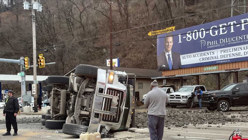 Dump truck overturns rear Rankin Bridge, spilling contents across Route 837 - WTAE Pittsburgh