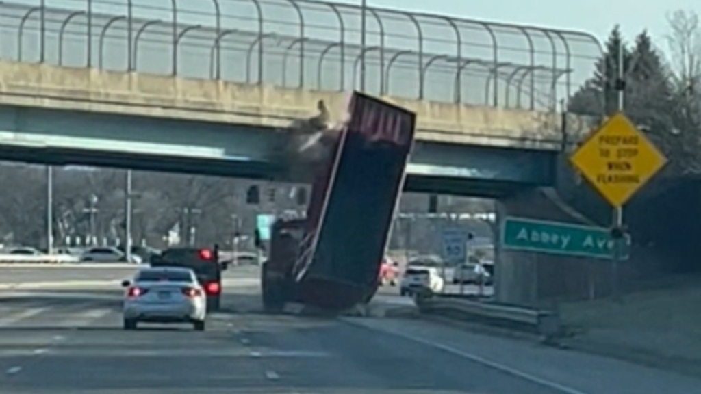 WATCH: Dump truck slams into overpass in Dayton - WHIO