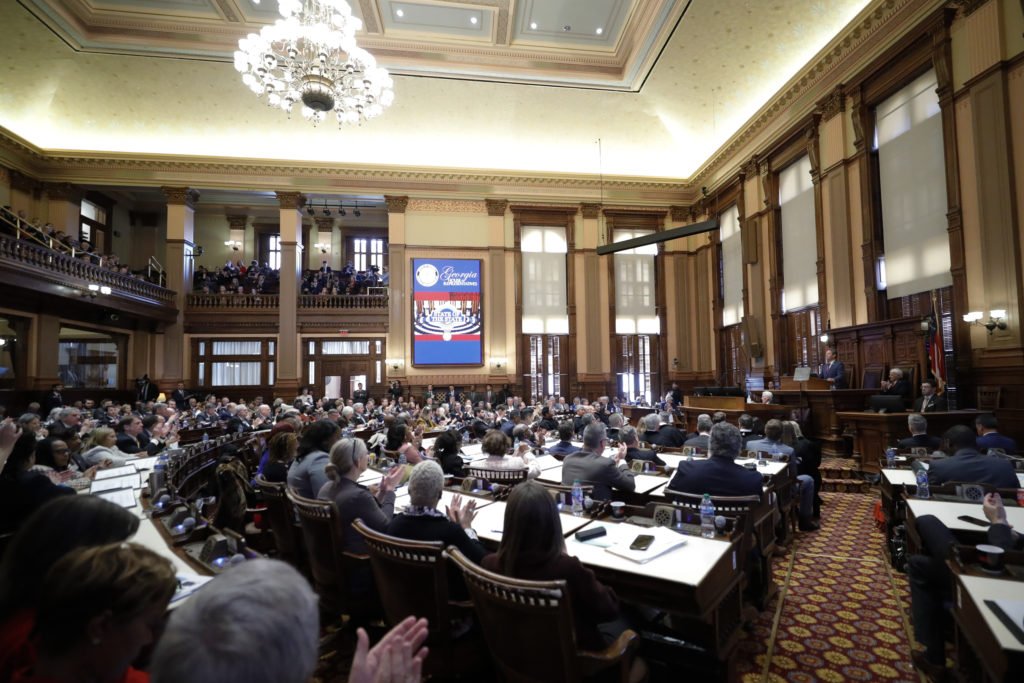Georgia Gov. Brian Kemp delivers the State of the State address on the House floor of the state Capitol on Wednesday, Jan. 25, 2023 in Atlanta. (AP Photo/Alex Slitz)