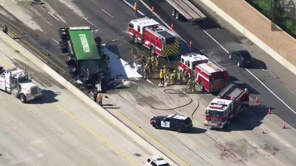 Big rig crashes through center divider, bursts into flames on 57 Freeway in O.C. - KTLA Los Angeles