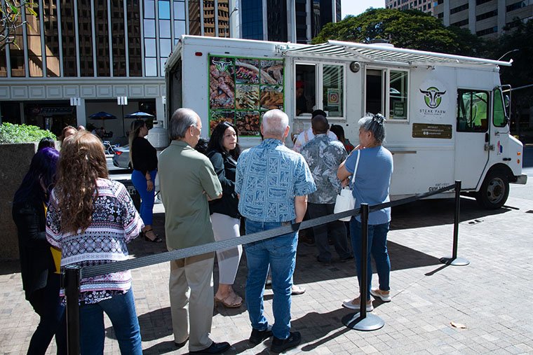 March 21, 2024  WDA Star-Advertiser photo by Craig T. Kojima
CKOJIMA@STARADVERTISER.COM. 

Monthly food truck event for downtown folks organized by Bank of Hawaii. Please get shots of people in line and eating lunch. Please also shoot people shopping at women vendors booths