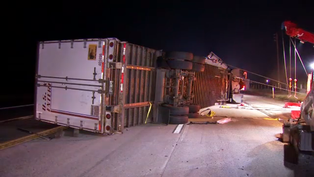 Semi truck overturns after hit-and-run crash in Madera County - KFSN-TV