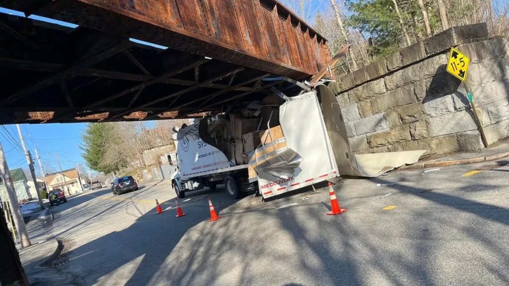WESTBROOK, Maine -- 4/9/2024 -- A truck driver crashed into the low bridge on Brown Street in Westbrook on Tuesday morning.