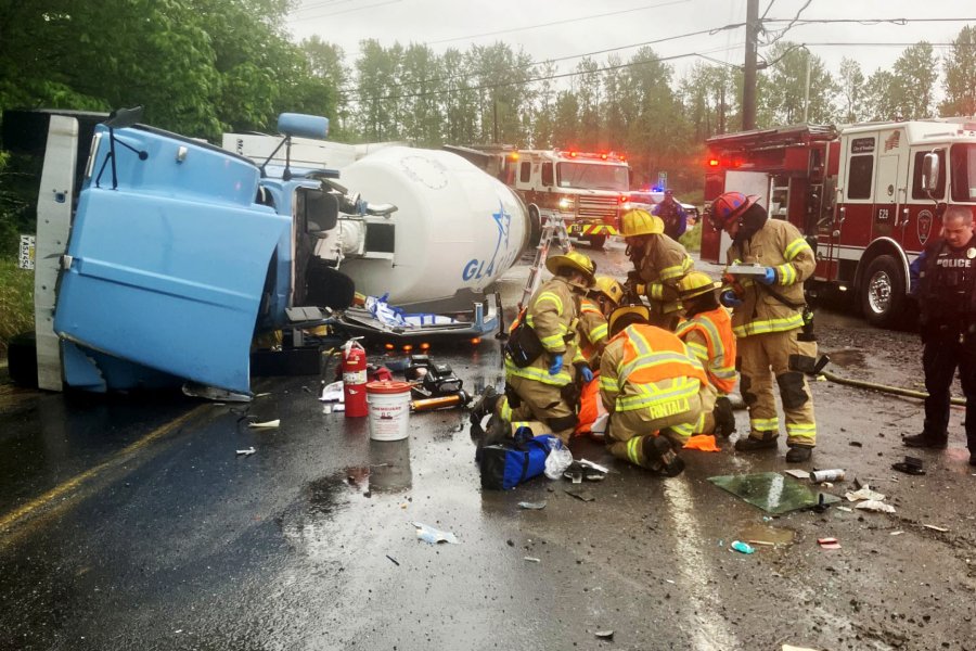 Driver rescued from overturned concrete mixer truck in Woodland - The Columbian