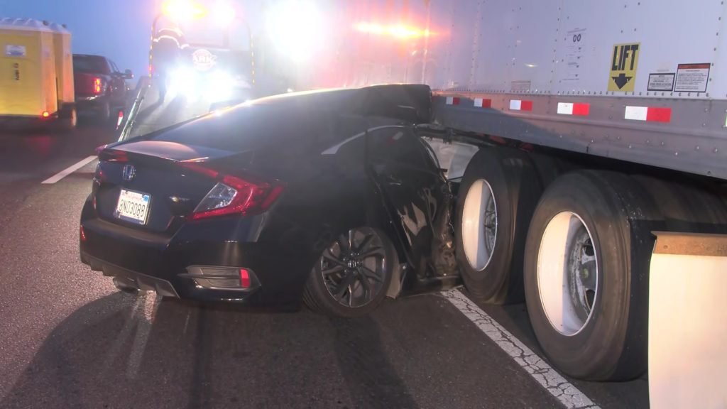 Car crashes into the back of a semi on Highway 99, dragged 200 feet - YourCentralValley.com