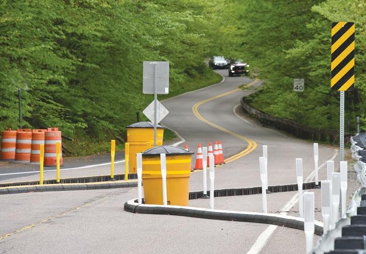 Barriers meant to prevent truck stuckages at Smugglers Notch get tested right away - VTDigger