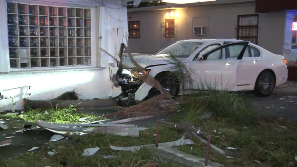 BMW slams into business after crash with pickup truck in Oakland Park - NBC Miami