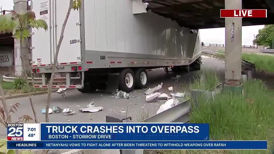 Tractor-trailer becomes wedged under overpass in crash on Storrow Drive - Boston 25 News