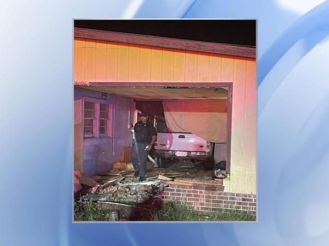 Truck drives into building in Scotland Neck; driver okay, police say - WRAL News