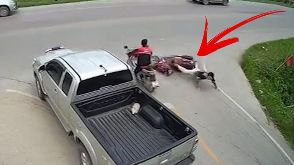 Near-death moment motorcyclist manages to avoid stopped truck at last minute - Yahoo News UK