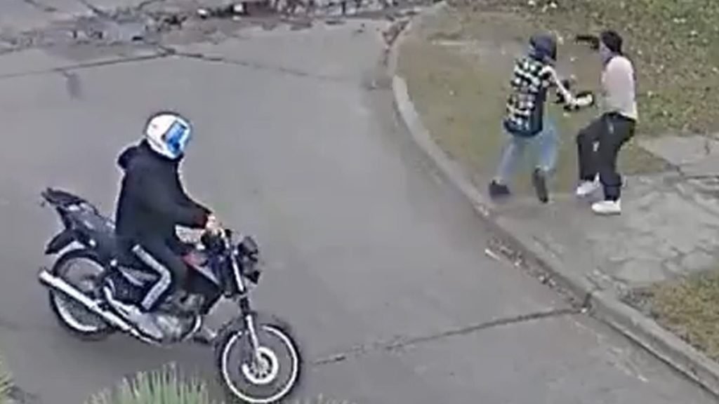 Moment pair of motorcycle muggers try to rob woman on street in Argentina before getting instant karma - Daily Mail