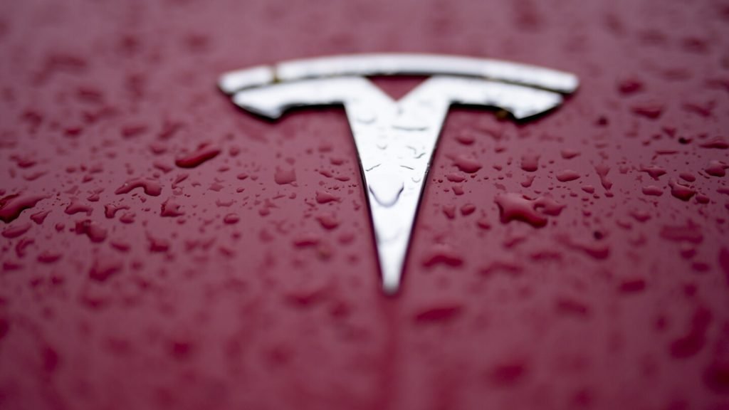 Tesla driver tells police he was using 'self-drive' system when his car hit a parked police vehicle - The Associated Press
