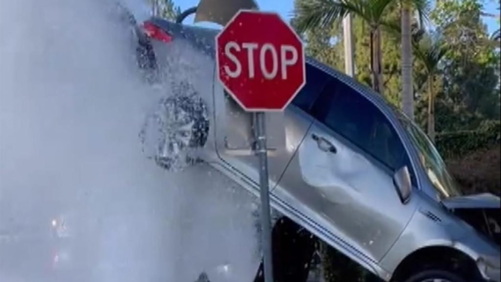 California: Car stuck on fire hydrant after collision - Sky News