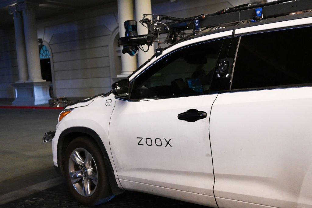 A Toyota sport-utility vehicle modified by Zoox, a subsidiary of Amazon.com, which combines radars, lidar, and cameras to test its software, drives on a road ahead of the Consumer Electronics Show (CES) of Las Vegas, Nevada on January 3, 2023. Zoox, which is developing an autonomous vehicle, is expected to present a robotaxi at CES. (Photo by Patrick T. Fallon / AFP) (Photo by PATRICK T. FALLON/AFP via Getty Images)